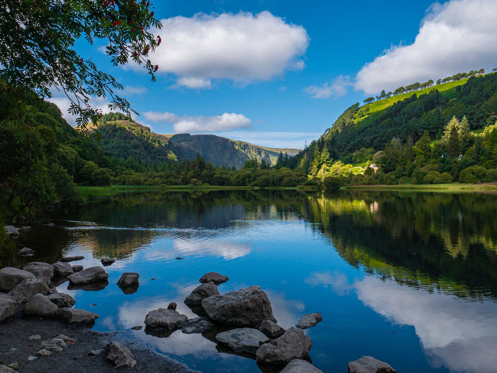 Glendalough Upper Lake mirror-still between the Wicklow mountains